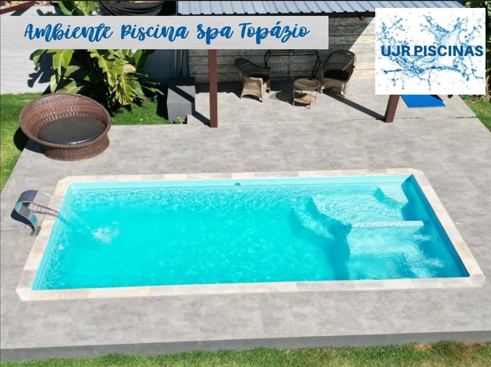 Piscina Spa Topázio com cascata e área de descanso